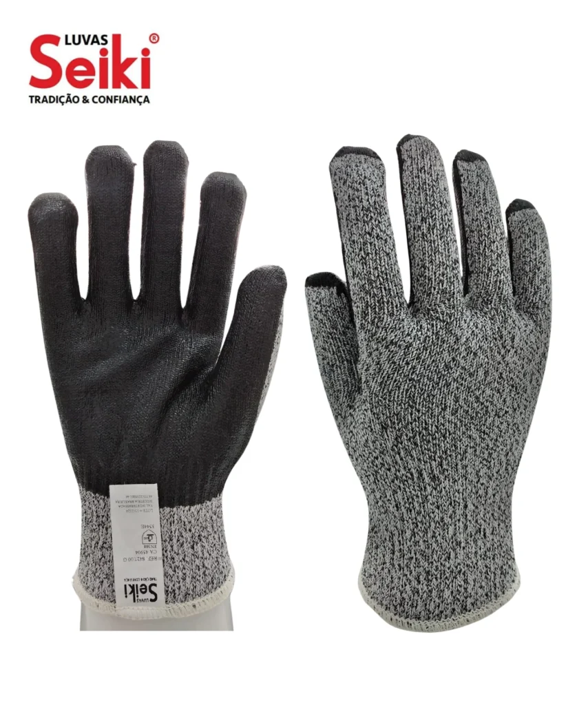 Luva de segurança confeccionada com dois fios de composto de polietileno com fibra de vidro de alta resistência a corte. Emborrachamento na palma e face palmar dos dedos com látex. Marca Seiki CA 45904 - Referência 8427.00